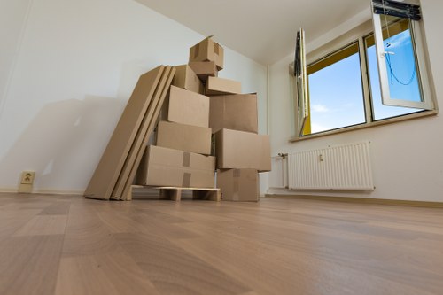 Removal team loading boxes for a house move in Ruislip
