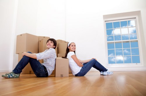 Packed moving boxes and furniture ready for local removal in Ruislip