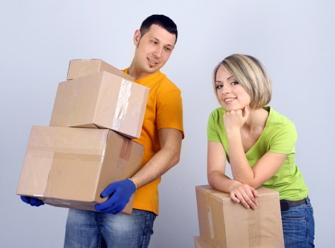 Packed boxes and furniture ready for local house removals