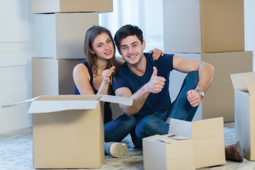 Careful loading of boxes and furniture into a moving van