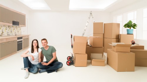 Packed boxes and furniture ready for transport