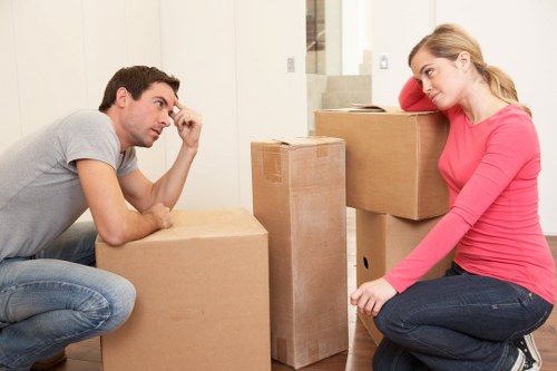 Local man with van loading household items in Ruislip